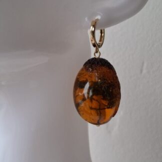 Amber kanjers aan creooltjes